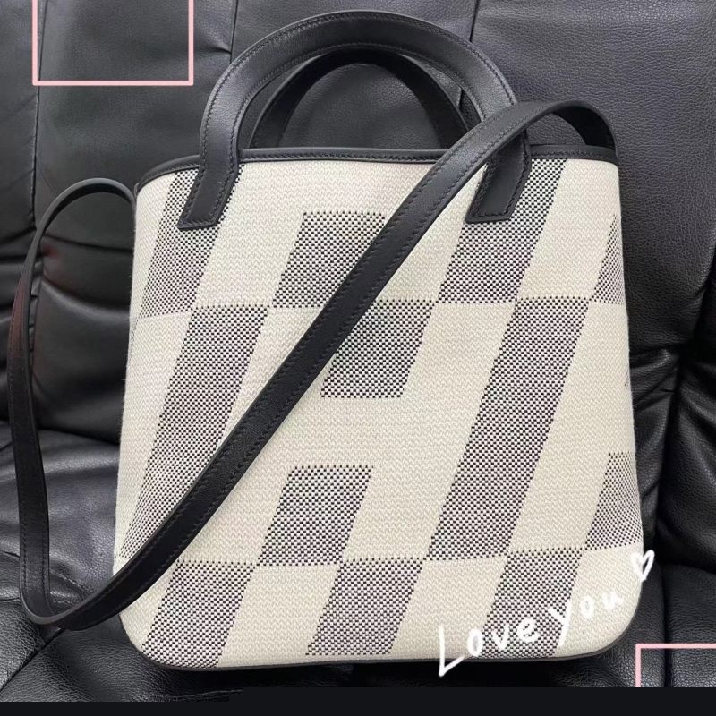 H**mes shopping bags